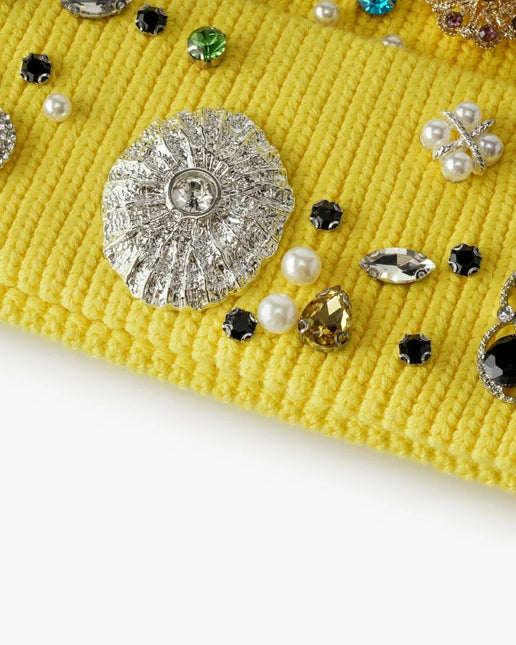 Valabasas yellow knit beanie embellished with an assortment of silver-toned metal, pearl, and colorful crystal studs.