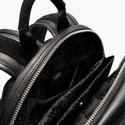 Valabasas La Borsa backpack featuring a black leather finish, metallic zipper hardware, and a branded interior lining.