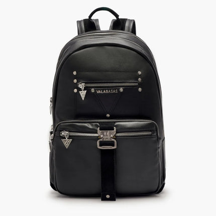 Valabasas La Borsa backpack in matte black vegan leather with silver metal hardware, side spikes, and buckle detail.