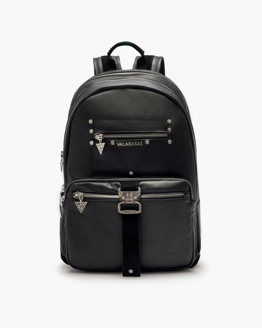 Valabasas La Borsa backpack in matte black vegan leather with silver metal hardware, side spikes, and buckle detail.